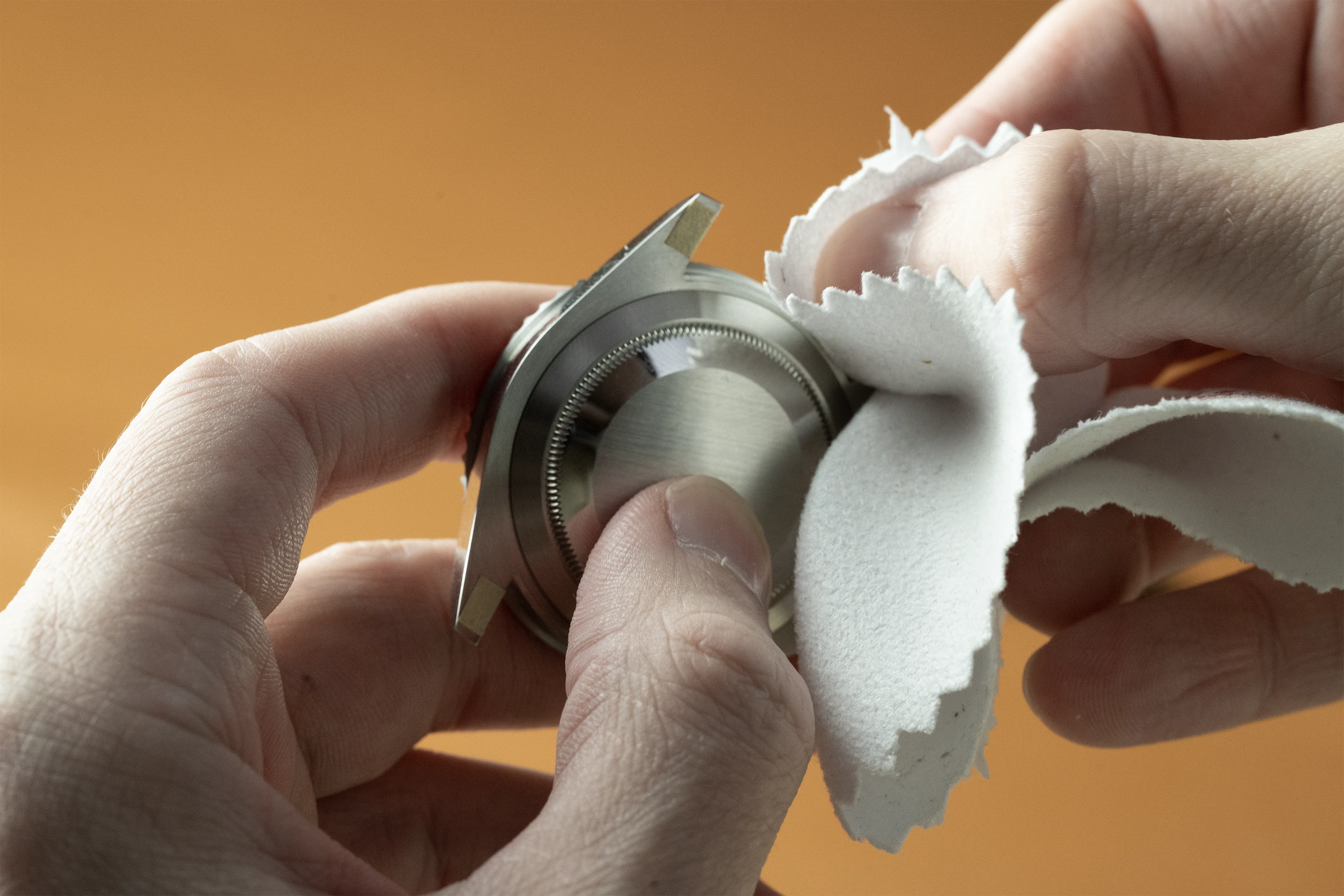Cleaning watch lugs with microfiber cloth